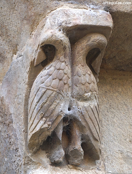 Dos aves en un canecillo